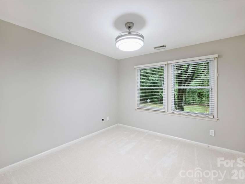 2500 Crescent Knoll Drive, Matthews, NC 28105.  MLS# CAR4399861, YatesRealty ID 37086. Second Bedroom