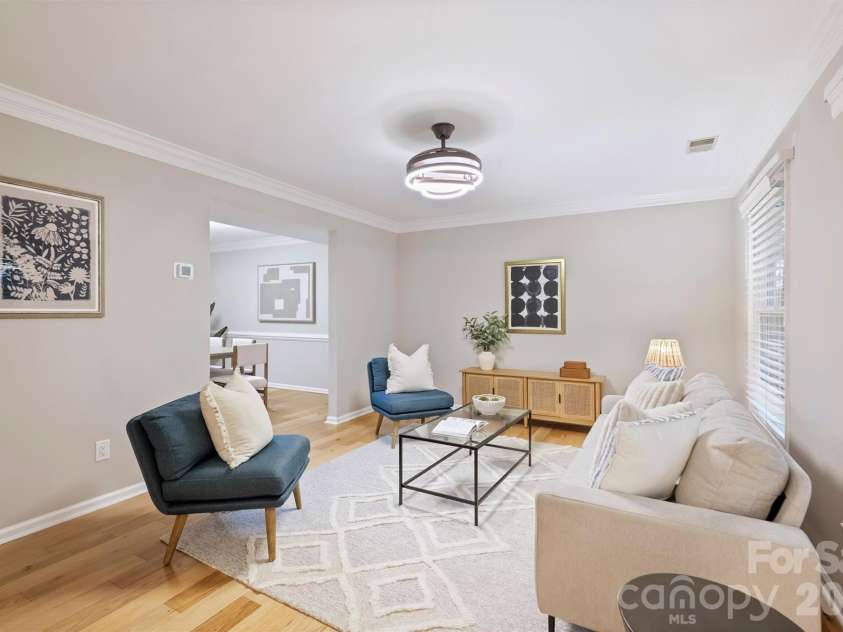 2500 Crescent Knoll Drive, Matthews, NC 28105.  MLS# CAR4399861, YatesRealty ID 37086. The welcoming foyer leads into the versatile formal living room—perfect as a home office, playroom, or second family room.