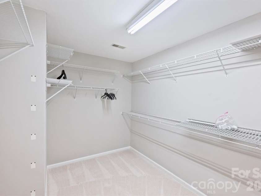 2500 Crescent Knoll Drive, Matthews, NC 28105.  MLS# CAR4399861, YatesRealty ID 37086. Walk-In Primary Closet