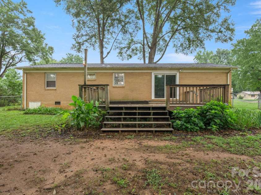 1557 Branchville Road, Shelby, NC 28150.  MLS# CAR4404443, YatesRealty ID 37088. Rear view showing the deck.  Deck does need some TLC