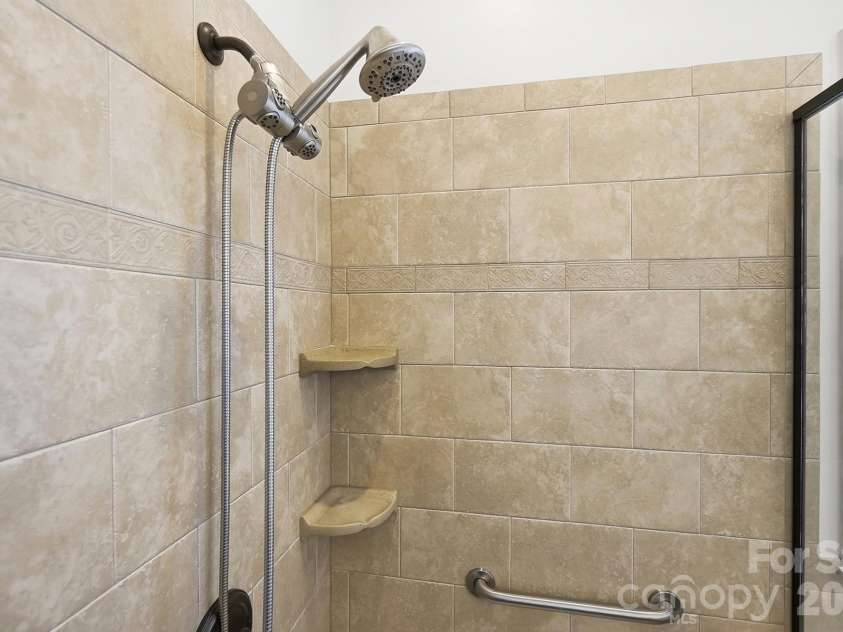 3076 Streamhaven Drive, Fort Mill, SC 29707.  MLS# CAR4403200, YatesRealty ID 37089. Tile shower