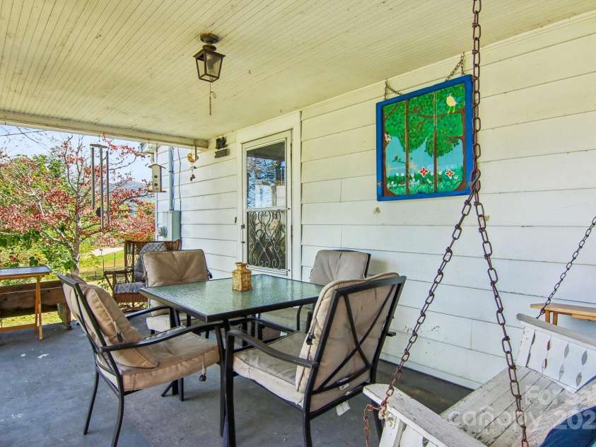 396 & 400 Will Hyatt Road, Waynesville, NC 28786.  MLS# CAR4191538, YatesRealty ID 3709. Front porch, 400 Will Hyatt