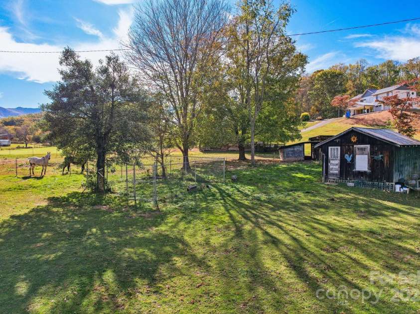 396 & 400 Will Hyatt Road, Waynesville, NC 28786.  MLS# CAR4191538, YatesRealty ID 3709. Horse pasture, Barn