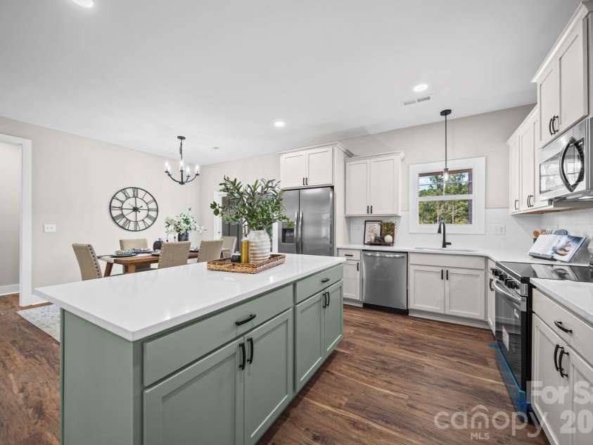 224 Plantation Way, Mount Gilead, NC 27306.  MLS# CAR4402494, YatesRealty ID 37097. Kitchen open to dining