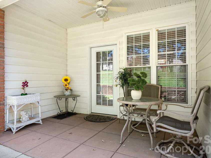 215 Knops Nob Road, Mooresville, NC 28115.  MLS# CAR4402529, YatesRealty ID 37098. Beautiful back patio for you to enjoy morning coffee