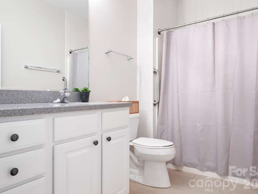 215 Knops Nob Road, Mooresville, NC 28115.  MLS# CAR4402529, YatesRealty ID 37098. Hall bathroom (walk in shower has handicap grip bar)