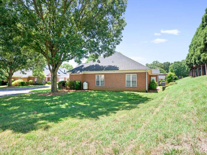 215 Knops Nob Road, Mooresville, NC 28115.  MLS# CAR4402529, YatesRealty ID 37098. Side view of home