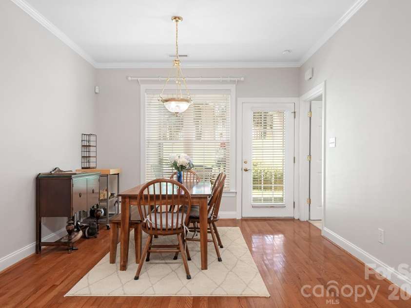 215 Knops Nob Road, Mooresville, NC 28115.  MLS# CAR4402529, YatesRealty ID 37098. Spacious dining area leading to back patio