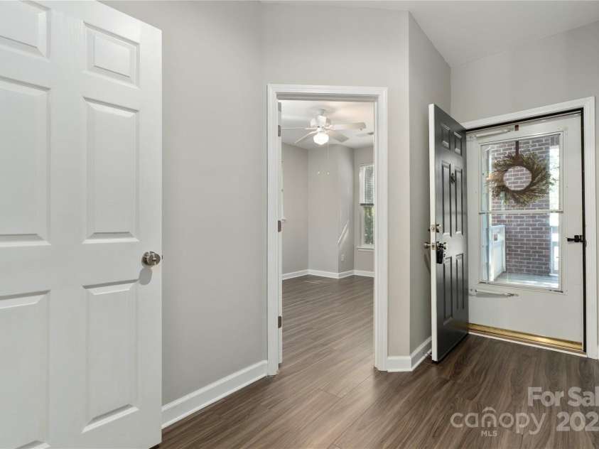 714 Northeast Drive, Davidson, NC 28036.  MLS# CAR4249415, YatesRealty ID 37098. Welcoming foyer with a secondary bedroom to the right as you enter.