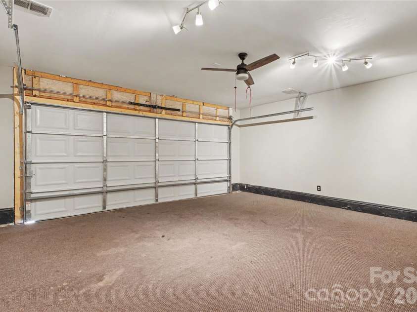 3786 Sedgewick Street, Concord, NC 28027.  MLS# CAR4397851, YatesRealty ID 37104. Finished and fully heated cable ready, lighted and enclosed water heater/closet