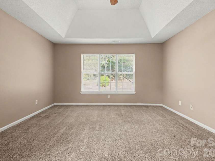 3786 Sedgewick Street, Concord, NC 28027.  MLS# CAR4397851, YatesRealty ID 37104. Primary bedroom with trey ceiling and fan