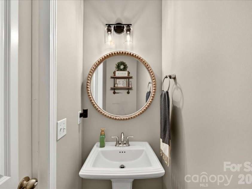 7585 Hartsfield Drive, Lancaster, SC 29720.  MLS# CAR4398685, YatesRealty ID 37108. Half Bath Down Stairs
