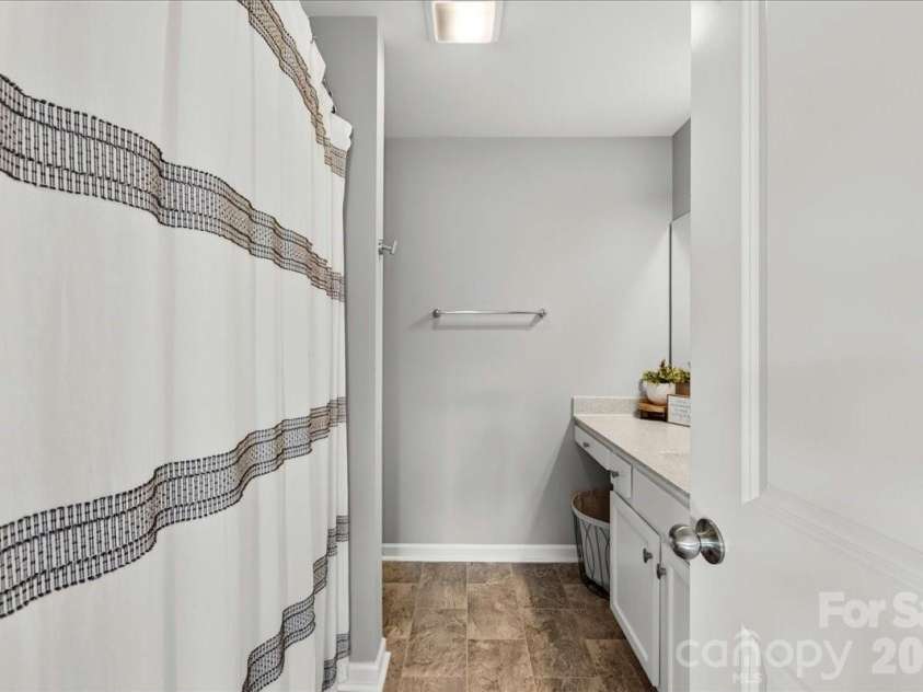 7585 Hartsfield Drive, Lancaster, SC 29720.  MLS# CAR4398685, YatesRealty ID 37108. Up Stairs Bathroom