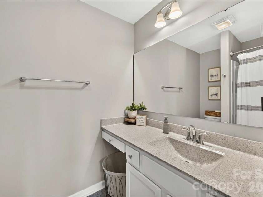 7585 Hartsfield Drive, Lancaster, SC 29720.  MLS# CAR4398685, YatesRealty ID 37108. Up Stairs Bathroom