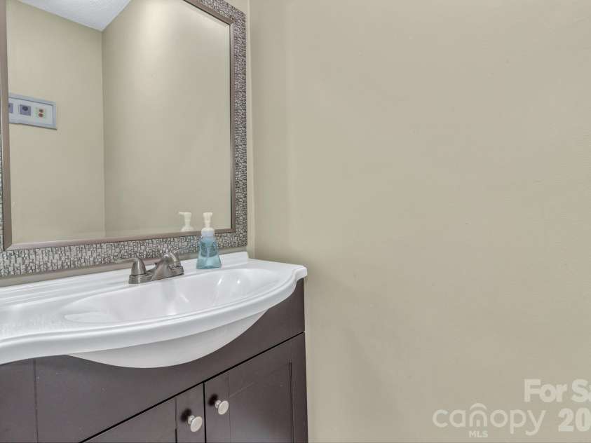 18 Mctindal Circle, Asheville, NC 28803.  MLS# CAR4399667, YatesRealty ID 37110. Half bath
