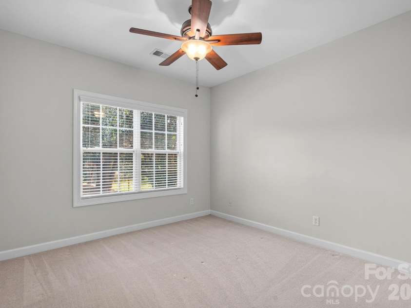 2305 Barrington Ridge Drive, Waxhaw, NC 28173.  MLS# CAR4394344, YatesRealty ID 37111. Guest Bedroom on Main Level