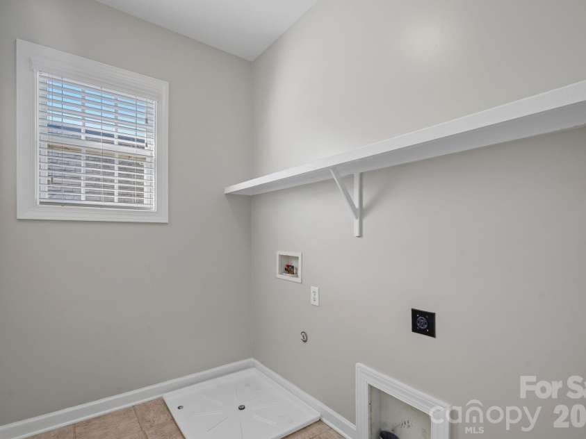 2305 Barrington Ridge Drive, Waxhaw, NC 28173.  MLS# CAR4394344, YatesRealty ID 37111. Laundry Room