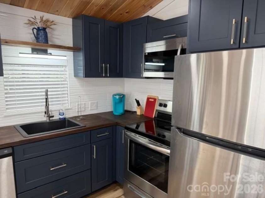 206 Cardinal Drive, New London, NC 28127.  MLS# CAR4356717, YatesRealty ID 3712. 