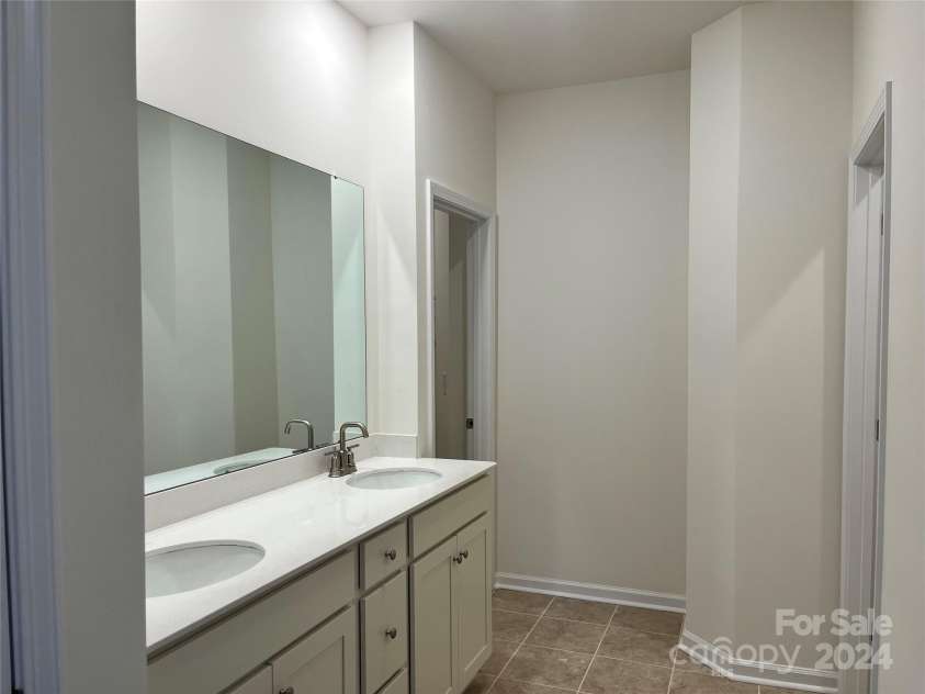 1044 Bull Dog Lane, Wingate, NC 28174.  MLS# CAR4192552, YatesRealty ID 3713. Primary Bath