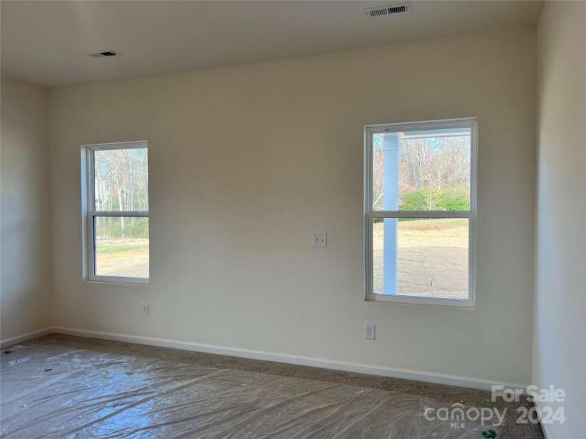 1044 Bull Dog Lane, Wingate, NC 28174.  MLS# CAR4192552, YatesRealty ID 3713. Primary Bedroom