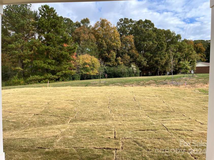 1044 Bull Dog Lane, Wingate, NC 28174.  MLS# CAR4192552, YatesRealty ID 3713. What a beautiful view from your patio!