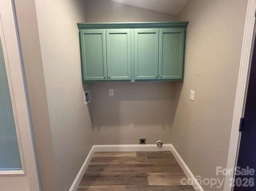 122 John Warren Drive, Forest City, NC 28043.  MLS# CAR4403495, YatesRealty ID 37138. Laundry area