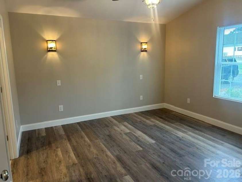 122 John Warren Drive, Forest City, NC 28043.  MLS# CAR4403495, YatesRealty ID 37138. Primary bedroom