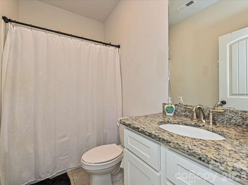 2119 Osten Run, Monroe, NC 28110.  MLS# CAR4403557, YatesRealty ID 37139. Full bathroom shared by the second and third bedrooms