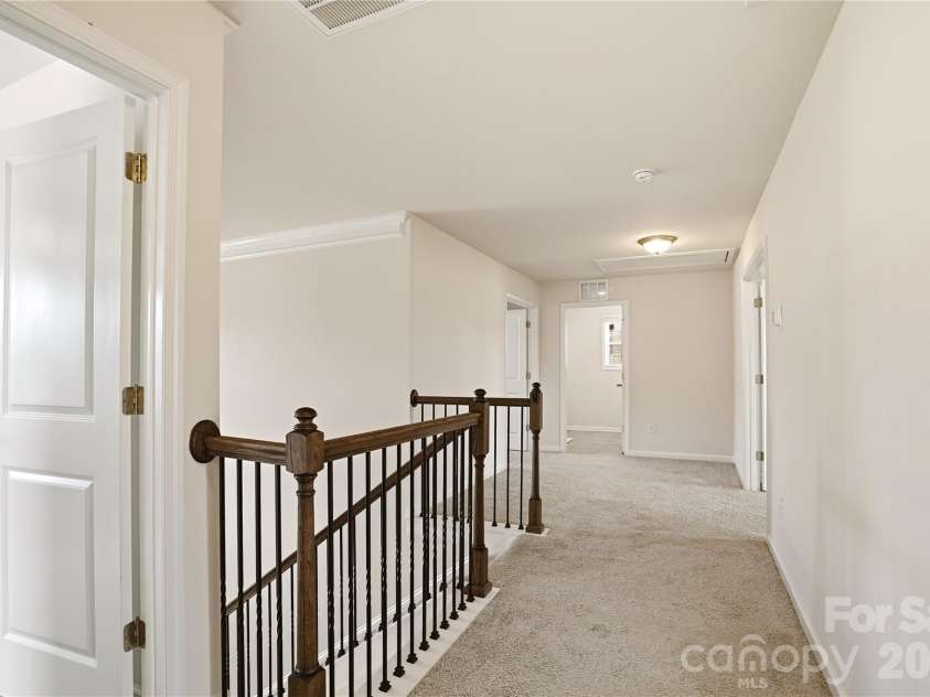 3025 Burnello Court, Iron Station, NC 28080.  MLS# CAR4356775, YatesRealty ID 3714. Reading nook on the Landing