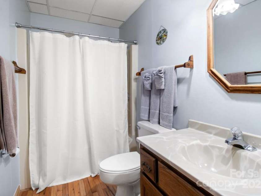563 Bee Tree Lane, Mars Hill, NC 28754.  MLS# CAR4317356, YatesRealty ID 3714. Downstairs full bathroom