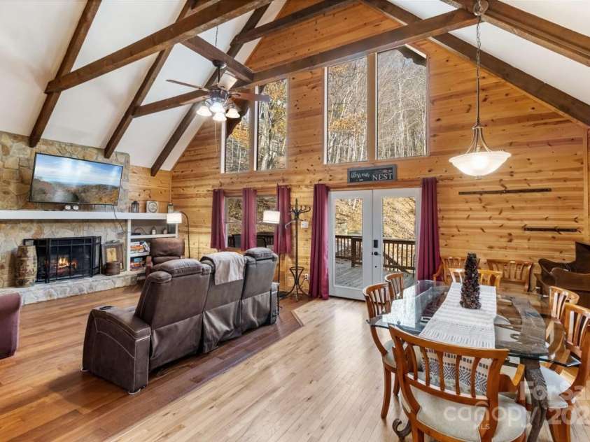 563 Bee Tree Lane, Mars Hill, NC 28754.  MLS# CAR4317356, YatesRealty ID 3714. Great room with Dining area.  Lots of windows to allow in natural light