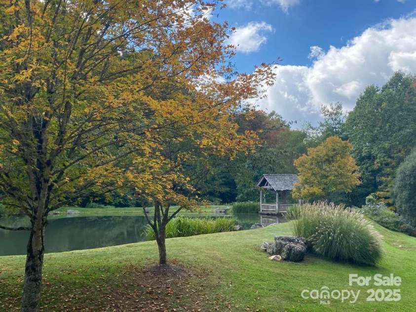 563 Bee Tree Lane, Mars Hill, NC 28754.  MLS# CAR4317356, YatesRealty ID 3714. Wolf Laurel Community Pond