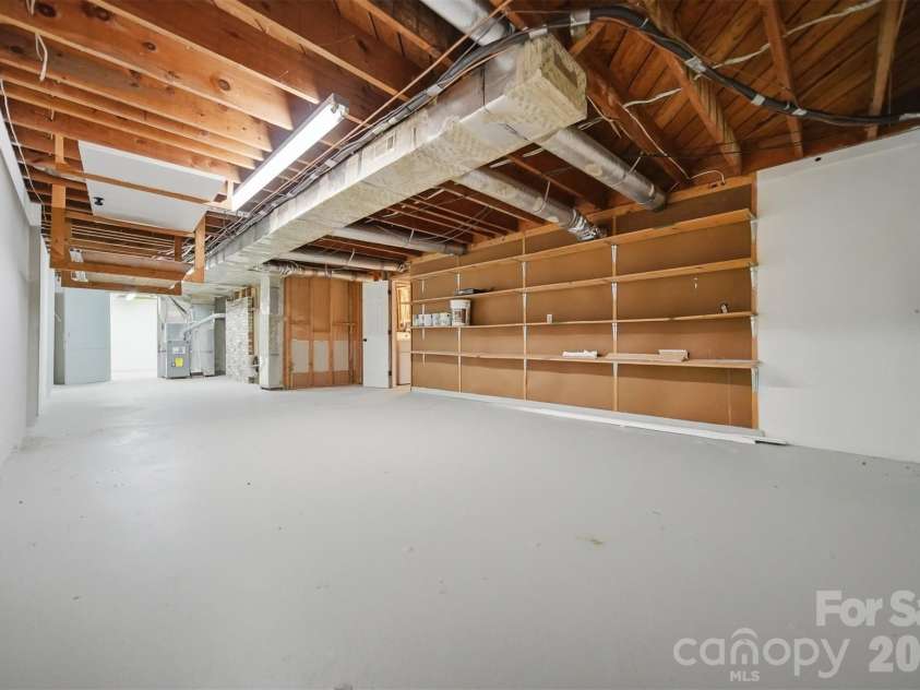 907 Vista Place, Lenoir, NC 28645.  MLS# CAR4403541, YatesRealty ID 37151. Flex space basement