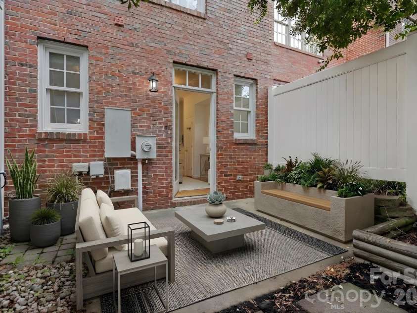 771 Old Meeting Way, Davidson, NC 28036.  MLS# CAR4403687, YatesRealty ID 37153. Digital Staging - Private courtyard