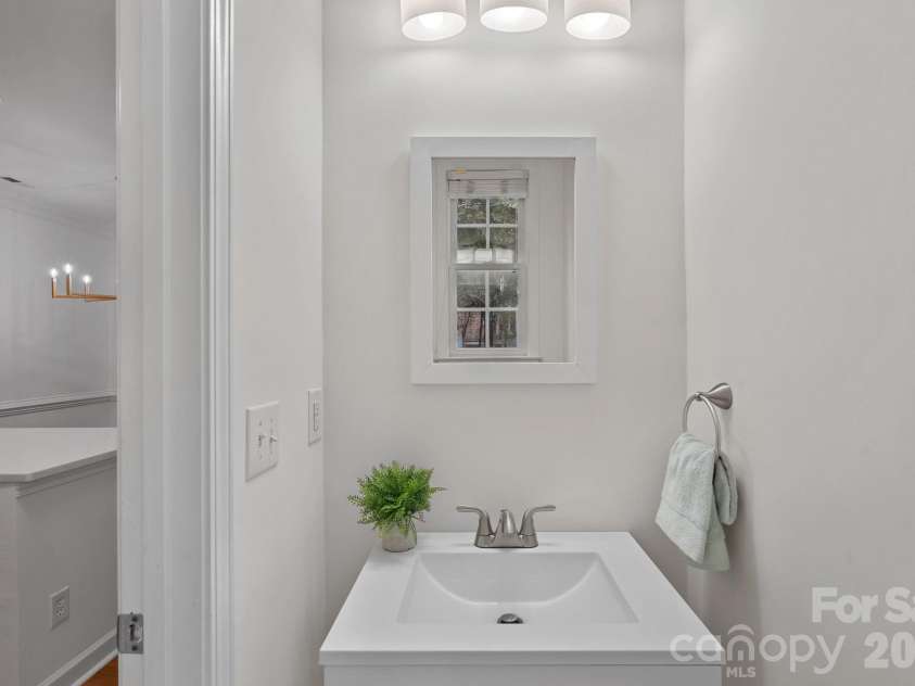 771 Old Meeting Way, Davidson, NC 28036.  MLS# CAR4403687, YatesRealty ID 37153. Main level 1/2 bath