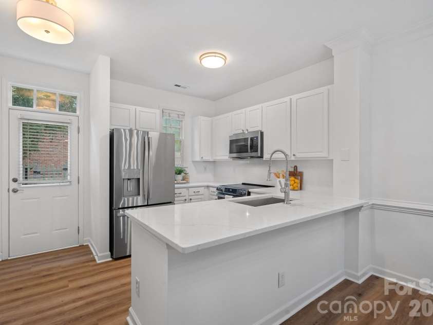 771 Old Meeting Way, Davidson, NC 28036.  MLS# CAR4403687, YatesRealty ID 37153. New renovation including quartz counters