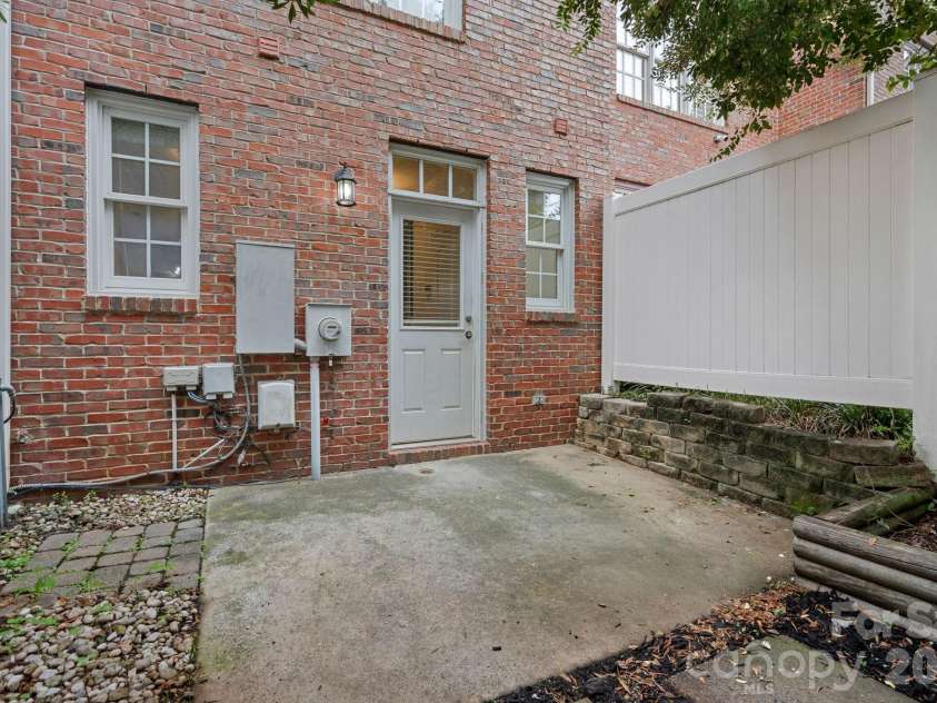 771 Old Meeting Way, Davidson, NC 28036.  MLS# CAR4403687, YatesRealty ID 37153. Your private garden or backyard dining await