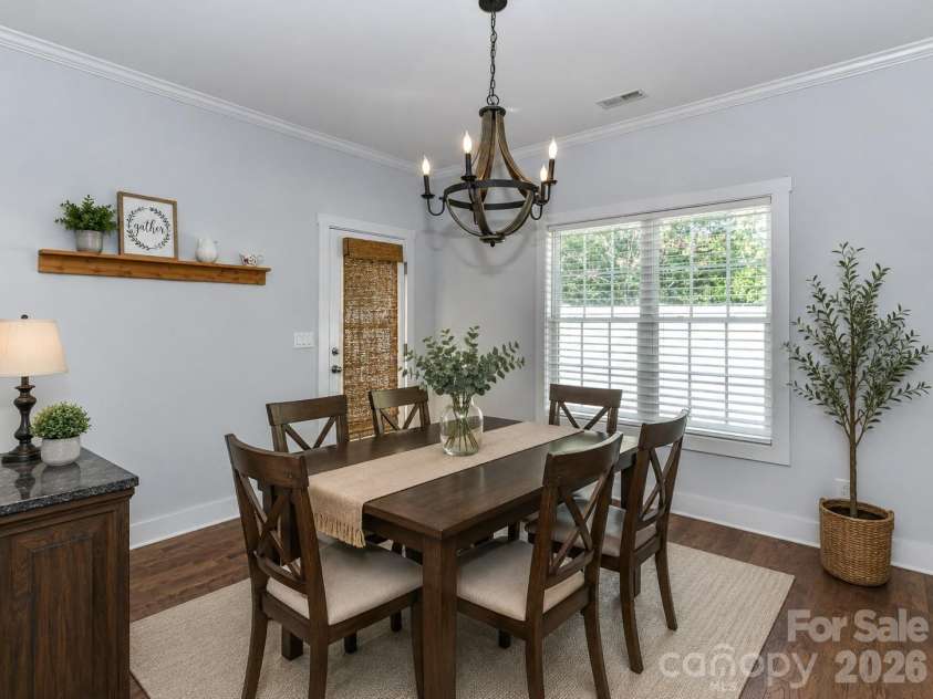 423 Ellicott Lane, Locust, NC 28097.  MLS# CAR4401969, YatesRealty ID 37156. AI Generated