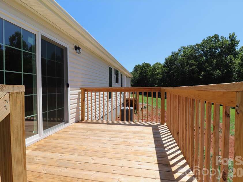 3093 Peaceful Meadows Drive, Morganton, NC 28655.  MLS# CAR4404361, YatesRealty ID 37162. Back Deck