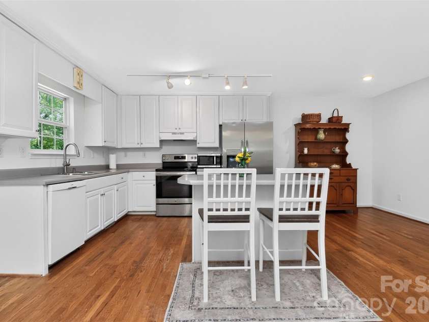 7912 Ritter Drive, Charlotte, NC 28270.  MLS# CAR4404263, YatesRealty ID 37180. Spacious kitchen with island!
