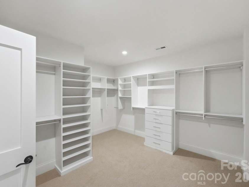 115 Thorncote Place, Charlotte, NC 28226.  MLS# CAR4402701, YatesRealty ID 37189. Primary bedroom closet