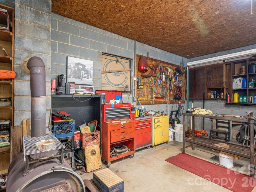 3323 Sadler Road, Alexis, NC 28006.  MLS# CAR4403471, YatesRealty ID 37191. Interior of workshop