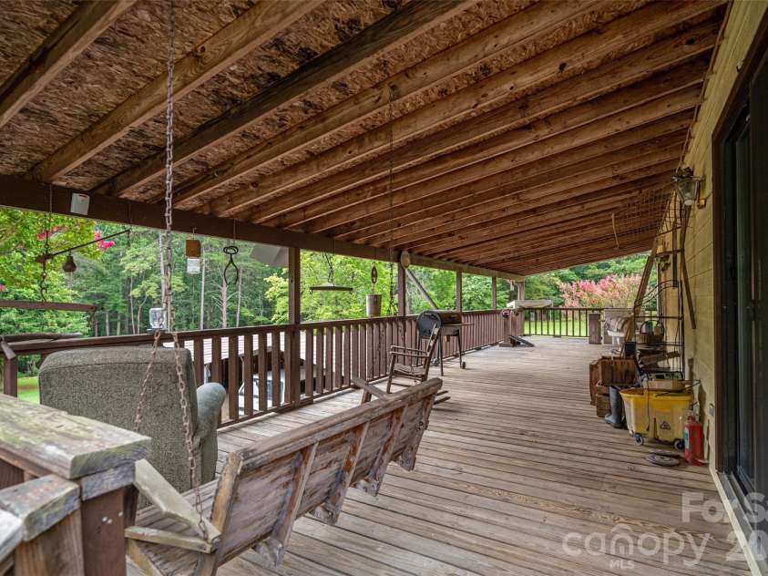 3323 Sadler Road, Alexis, NC 28006.  MLS# CAR4403471, YatesRealty ID 37191. Large covered back porch