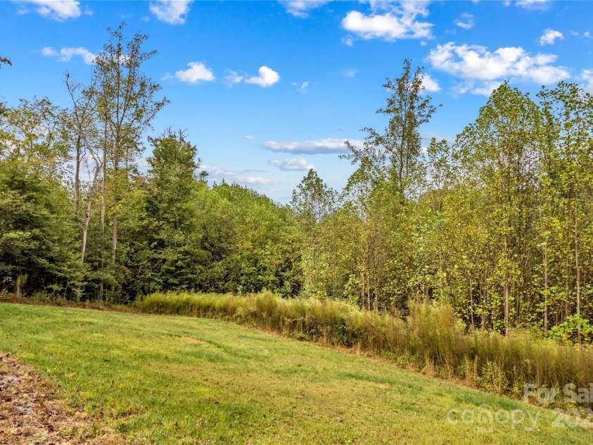 1136 Bauguess Mill Road, Traphill, NC 28685.  MLS# CAR4309266, YatesRealty ID 372. 