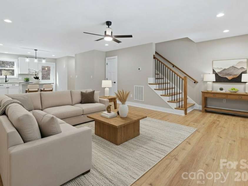 328 Bowditch Street, Burnsville, NC 28714.  MLS# CAR4332968, YatesRealty ID 3720. Open-concept living room with functional flow for entertaining and daily use.