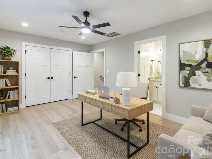 328 Bowditch Street, Burnsville, NC 28714.  MLS# CAR4332968, YatesRealty ID 3720. Second primary suite offering flexible space for guests, a home office, or everyday living needs.