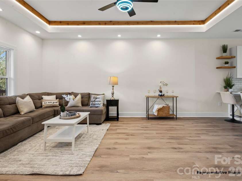 712 Jackson Terrace, Concord, NC 28027.  MLS# CAR4404681, YatesRealty ID 37214. Living Room(Representative Image)