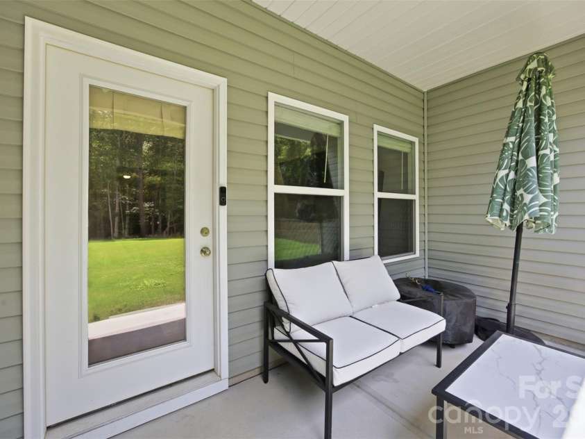 2943 Parkwest Drive, Albemarle, NC 28001.  MLS# CAR4404835, YatesRealty ID 37227. Covered Back Porch