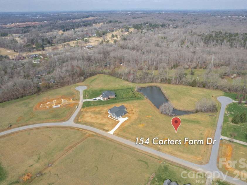 154 Carters Farm Drive, Statesville, NC 28625.  MLS# CAR4240433, YatesRealty ID 3723. Aerial View of Pond Lot