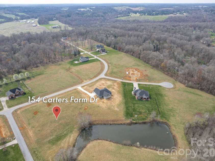 154 Carters Farm Drive, Statesville, NC 28625.  MLS# CAR4240433, YatesRealty ID 3723. Aerial View of Pond Lot